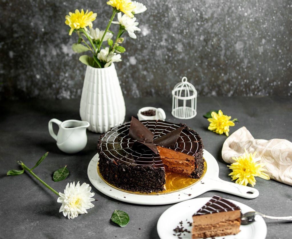 chocolate cake with dark chocolate syrup on top